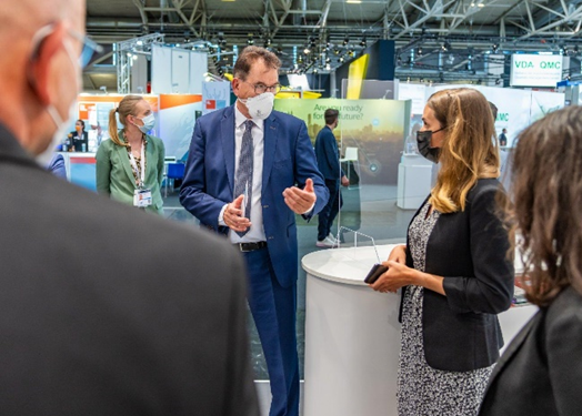 BM Müller with Lisa Stellner (GIZ, X4D) at IAA Mobility in Munich, September 2021