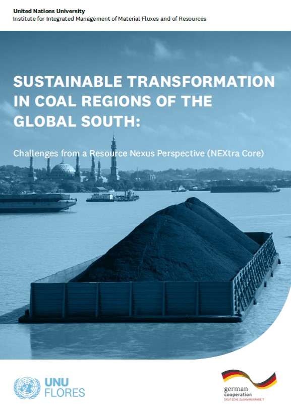 the cover shows a container ship loaded with coal on a river.